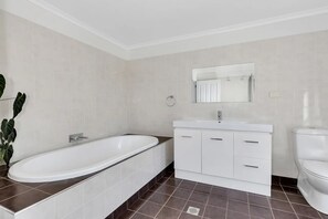 Basic Quadruple Room, Balcony, Lake View | Bathroom | Slippers