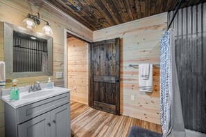 Shower, towels, soap, toilet paper