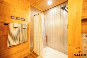 Shower, towels, soap, toilet paper