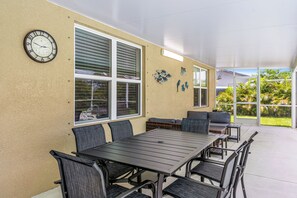 Outdoor dining - Heated Lanai Pool • Epic Game Room • 15 Min to Beach • Private Yard (Cape Coral)