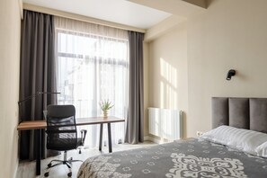 1 slaapkamer, een strijkplank/strijkijzer, wifi, beddengoed