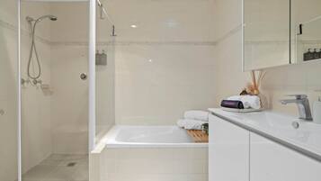Hair dryer, towels, soap, shampoo