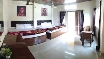 Premium bedding, memory-foam beds, desk, laptop workspace