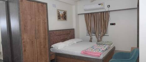 Down duvets, pillow-top beds, desk, laptop workspace