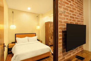 Departamento Deluxe | Escritorio, espacio para trabajar con laptop y cortinas blackout 