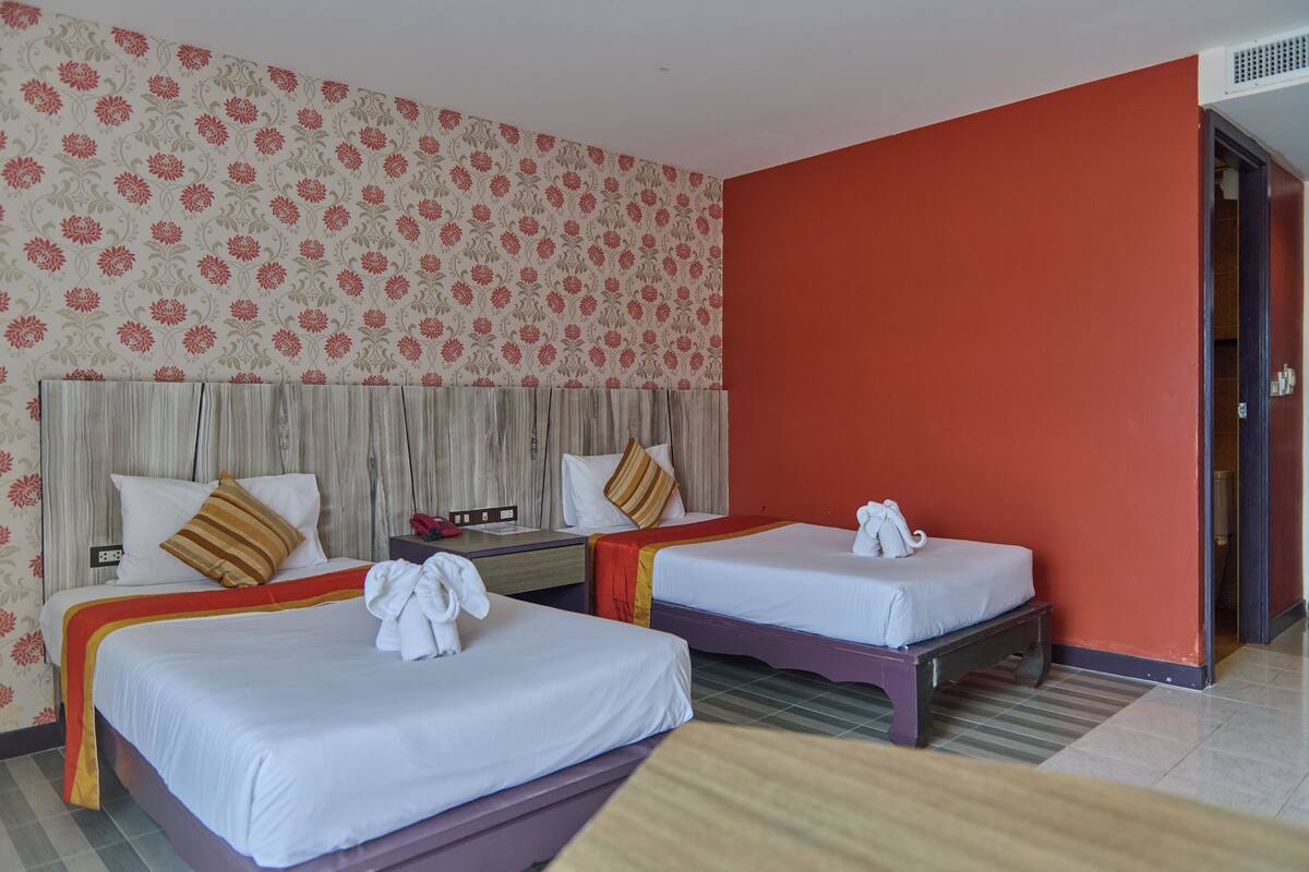 Deluxe Twin Room, Balcony, Mountain View | In-room safe, desk, laptop workspace, iron/ironing board