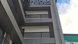 A building with a sign that reads "Ecko Premier New Yoga". - ECKO Premier New Yoga (Joshimath)