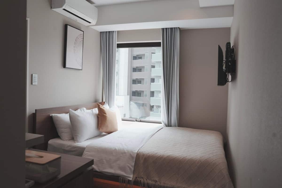 Economy Double Room, City View | Desk, blackout drapes, soundproofing, free WiFi