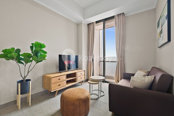 Apartemen, 2 kamar tidur, pemandangan kota | Area keluarga | Smart TV 43-inci dengan saluran TV kabel, Netflix, dan layanan streaming