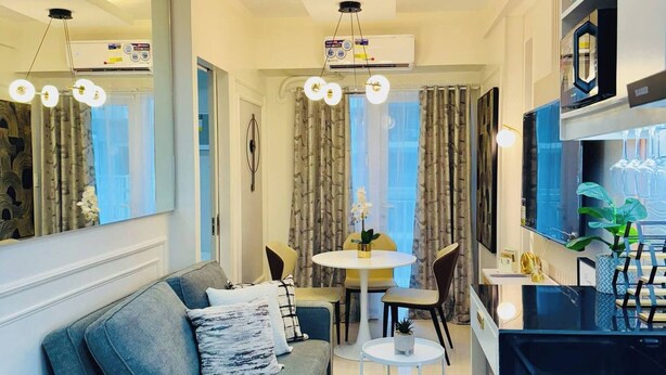 TV - Stylish Condo Room in Iloilo City with Shared Pool (Iloilo City)