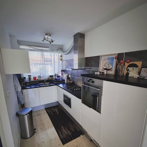 Fridge, microwave, dishwasher, coffee/tea maker