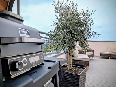 Exclusive family retreat with a rooftop terrace and sauna