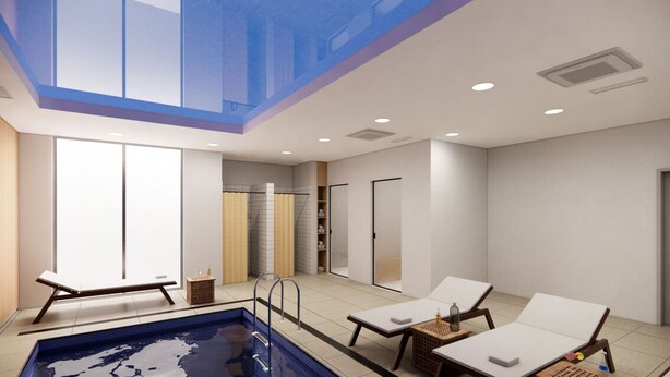A modern indoor pool area with a glass ceiling, lounge chairs, and a small pool. - Surxondaryo Hotel (Tashkent)