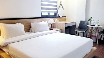 Habitación Deluxe doble | Caja fuerte, cortinas opacas, wifi gratis