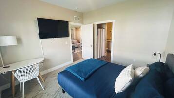 3 bedrooms, desk, iron/ironing board, travel crib