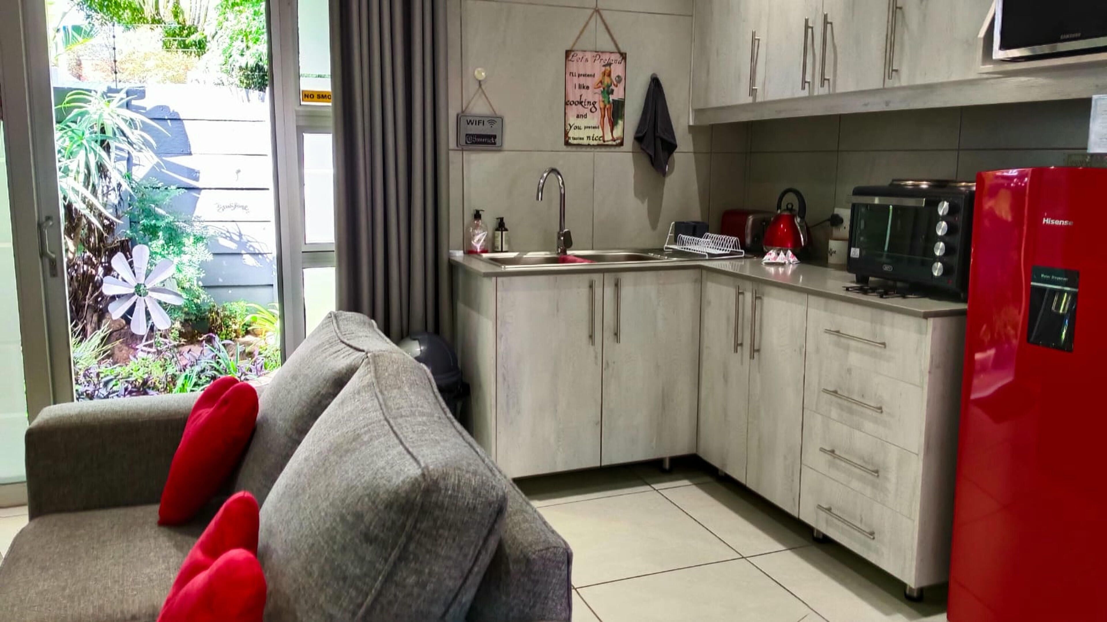 Family Double Room, Patio, Garden View | Private kitchen | Full-size fridge, microwave, oven, stovetop