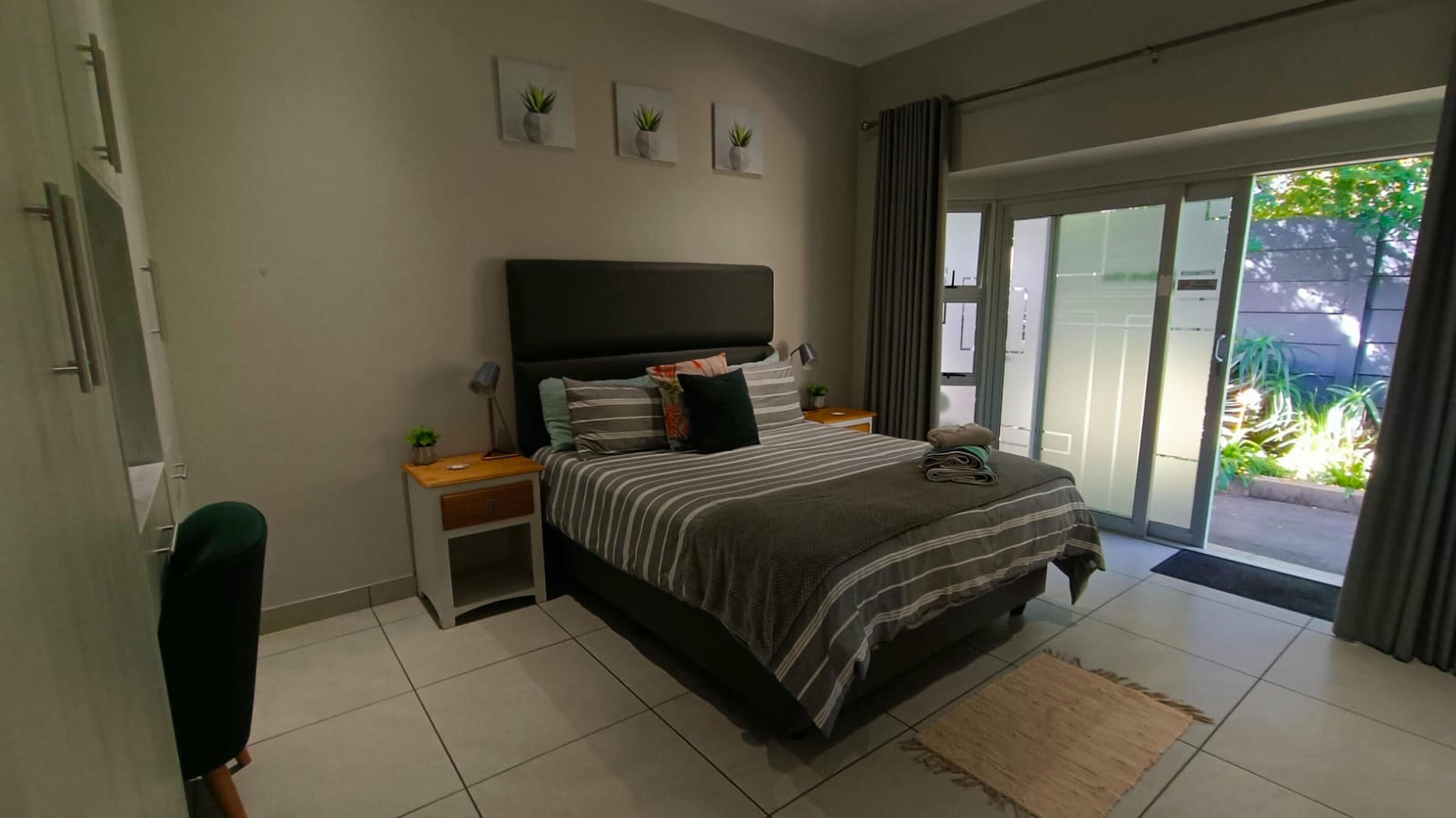 Luxury Double Room, Patio, Garden View | Down duvets, in-room safe, individually decorated