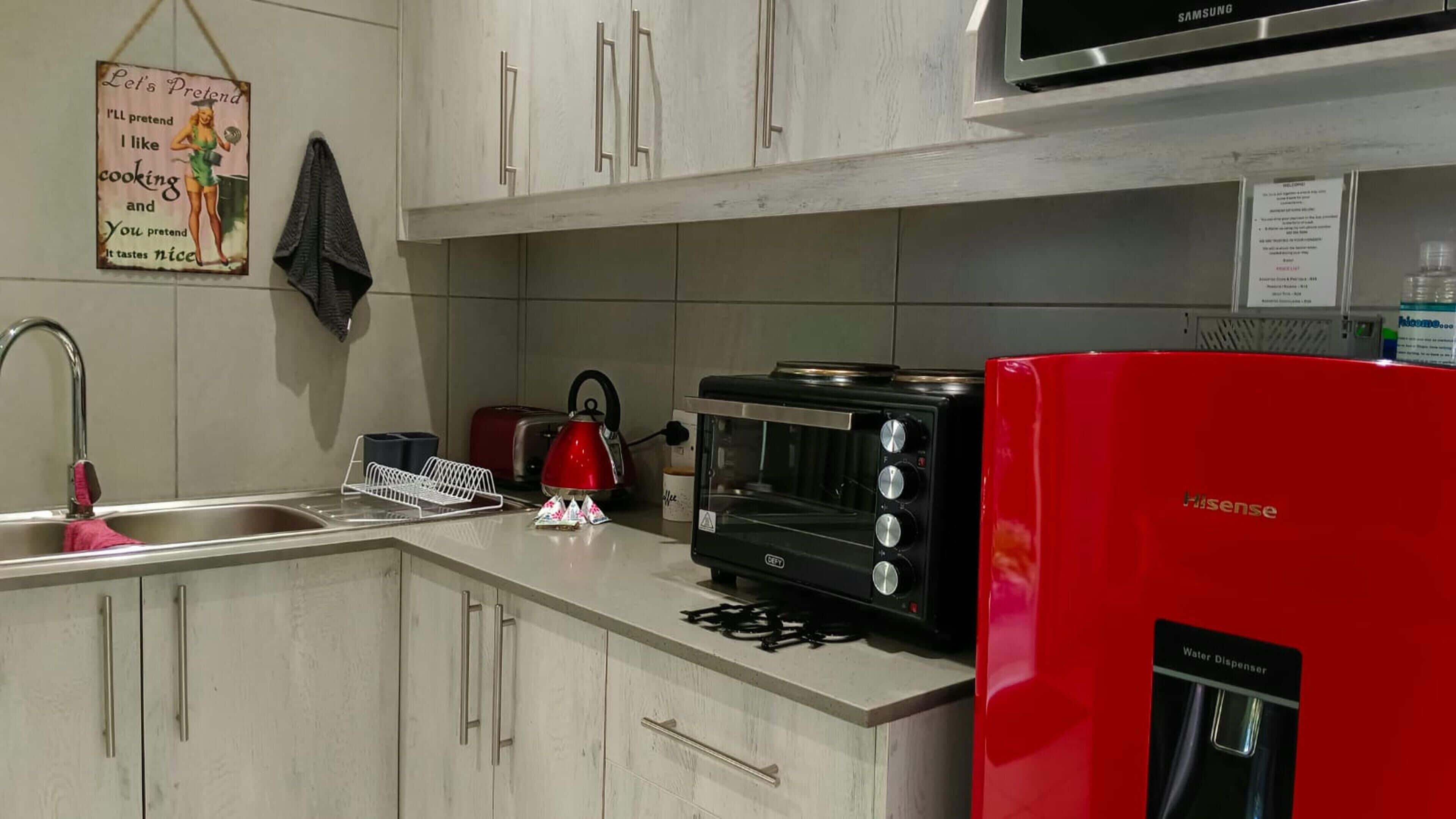 Chambre Double Familiale, patio, vue jardin | Cuisine privée