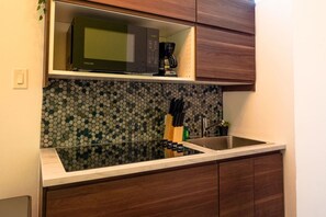 Fridge, microwave, stovetop, coffee/tea maker