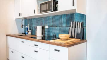 Fridge, microwave, stovetop, coffee/tea maker