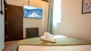 2 bedrooms, iron/ironing board, WiFi, bed sheets