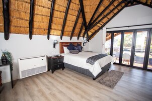 Luxury Studio Suite, Balcony, Pool View | Laptop workspace, free WiFi, bed sheets