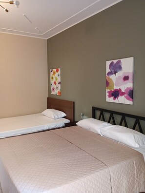 4 bedrooms, iron/ironing board, travel cot, WiFi