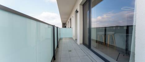 Deluxe Apartment, Balcony, City View | Terrace/patio