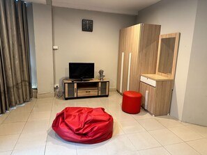 Chambre simple Deluxe, vue sur la ville | Aire de séjour