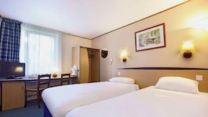 A hotel room with two beds, a desk with a chair, a television, and a painting on the wall. - The Beacon Hotel, Cardiff, Part of the AG Collection (Cardiff)