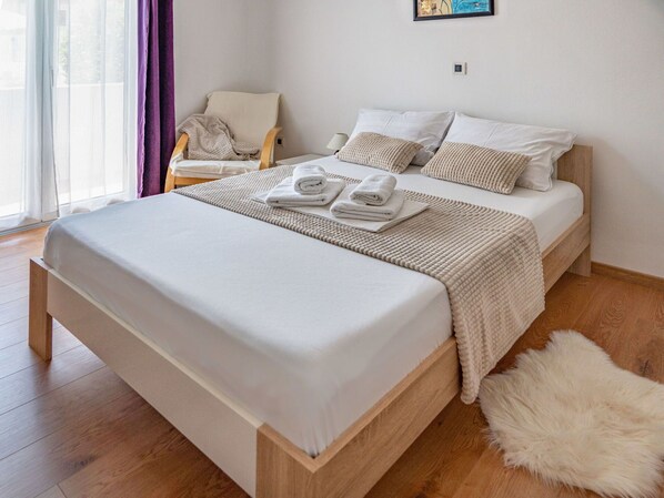 Bed, Furniture, Bedroom, Bedding, Interior Design, Bed Sheet, Floor, Wood, Flooring, Linens