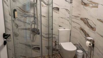 Shower, free toiletries, hair dryer, towels