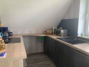Kylskåp, ugn, spishäll och diskmaskin