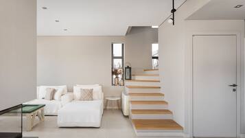 Luxury Villa, Sea View | Living area | 50-inch Smart TV with digital channels, fireplace