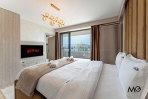 Deluxe Apartment, Mountain View | Premium bedding, down comforters, memory foam beds, blackout drapes - MoHost Valcom - Luxury Skyline Penthouse (Brașov)