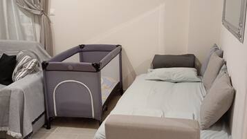 2 bedrooms, desk, iron/ironing board, travel cot