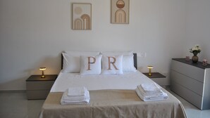 2 bedrooms, desk, iron/ironing board, travel crib