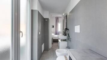 Shower, bidet, towels, soap