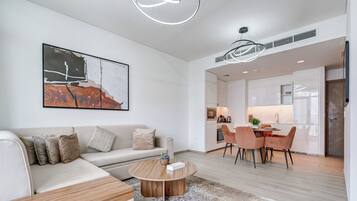 Luxury Apartment, Balcony, River View | Living room | 55-inch Smart TV with digital channels