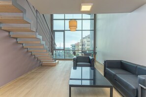 Loft L4 - Sea view | Living area | 43-inch Smart TV with digital channels, streaming services - Jounieh Living - Residences by Local Host (Jounieh)