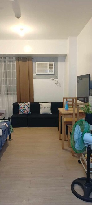Living room - Luxurious 9th Floor Studio in Quezon City With Private Pool (Quezon City)