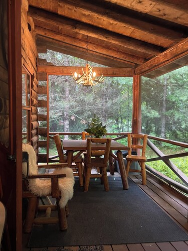 Elegant and cozy log cabin combines vintage design with contemporary luxury