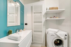 Shower, bidet, towels, soap