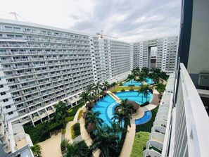 Apartment, 1 Bedroom, Smoking, City View | Pool | Outdoor pool - Relax in Pasay City at Shell Residences - Your Home Away From Home (Pasay)