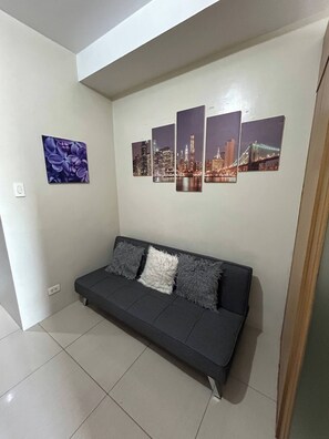 Apartment, 1 Bedroom, Smoking, City View | Living area - Relax in Pasay City at Shell Residences - Your Home Away From Home (Pasay)