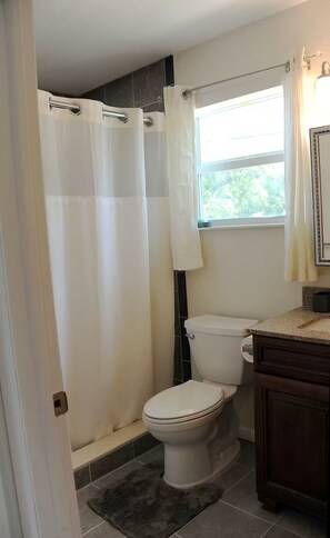 Shower, towels, soap, toilet paper
