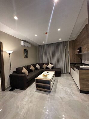 Appartement, 1 chambre, accessible aux personnes à mobilité réduite, fumeur | Coin séjour