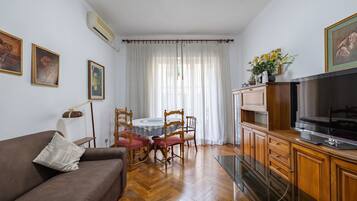 Apartment, 2 Bedrooms, Balcony | Living area | 30-inch TV with satellite channels