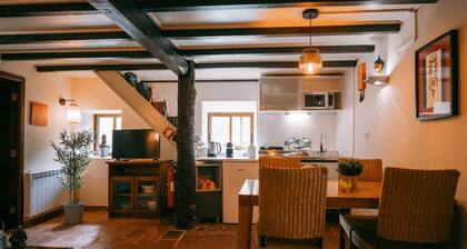 Charming holiday apartment with shared heated pool and Japanese garden.