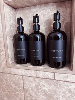 Hair dryer, towels, soap, toilet paper